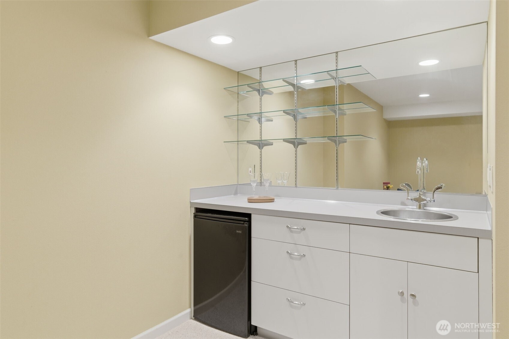 2263 Lost Mountain Road Sequim, WA 98382 - Photo 27 of 40 a bathroom with a sink and a mirror