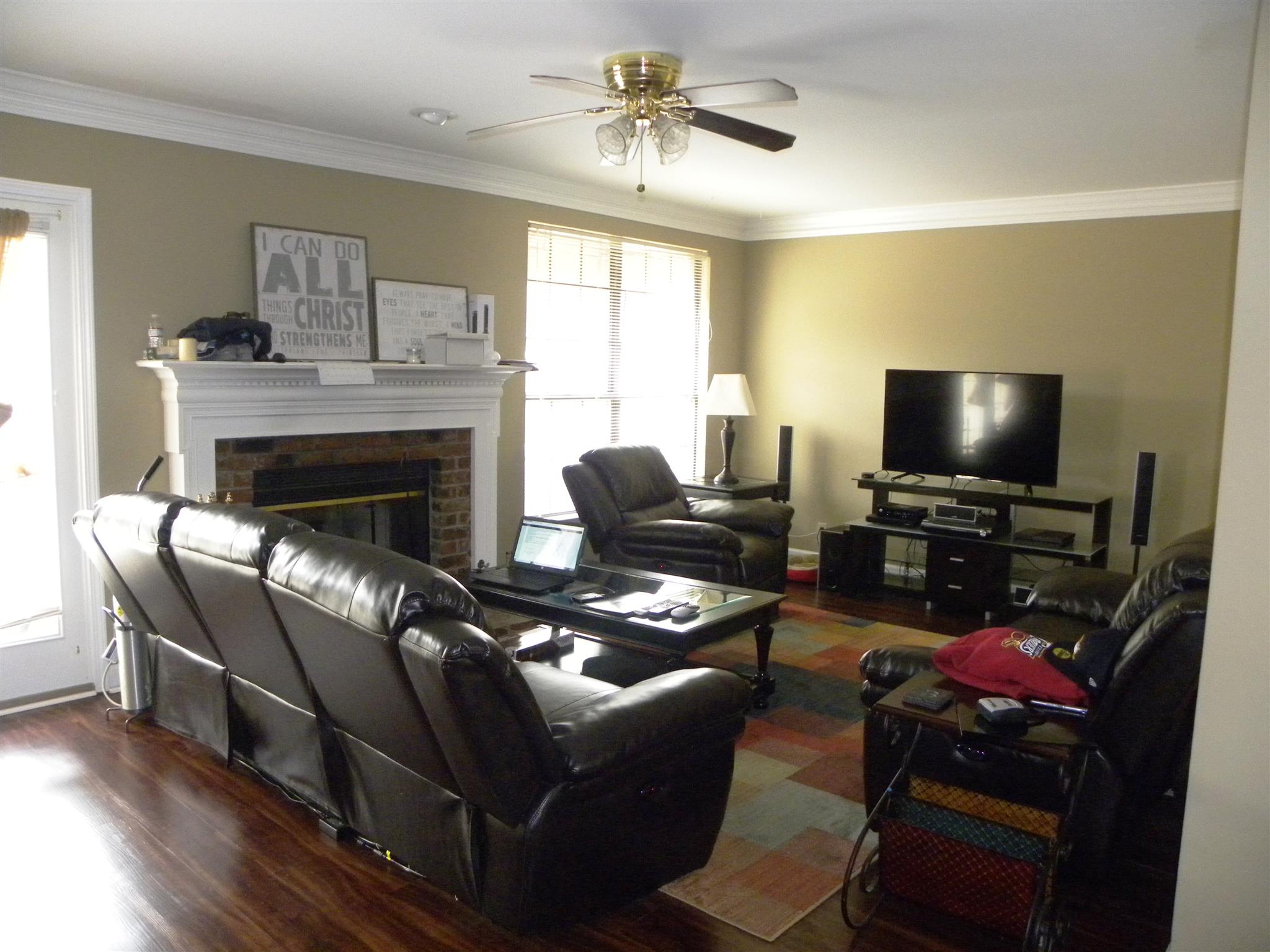745 General George Patton Road Nashville, TN 37221 - Photo 5 of 12 a living room with furniture a flat screen tv and a fireplace