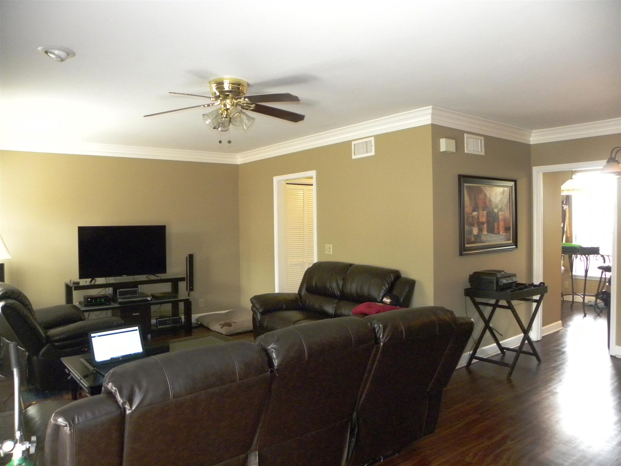 745 General George Patton Road Nashville, TN 37221 - Photo 6 of 12 a living room with furniture and a flat screen tv