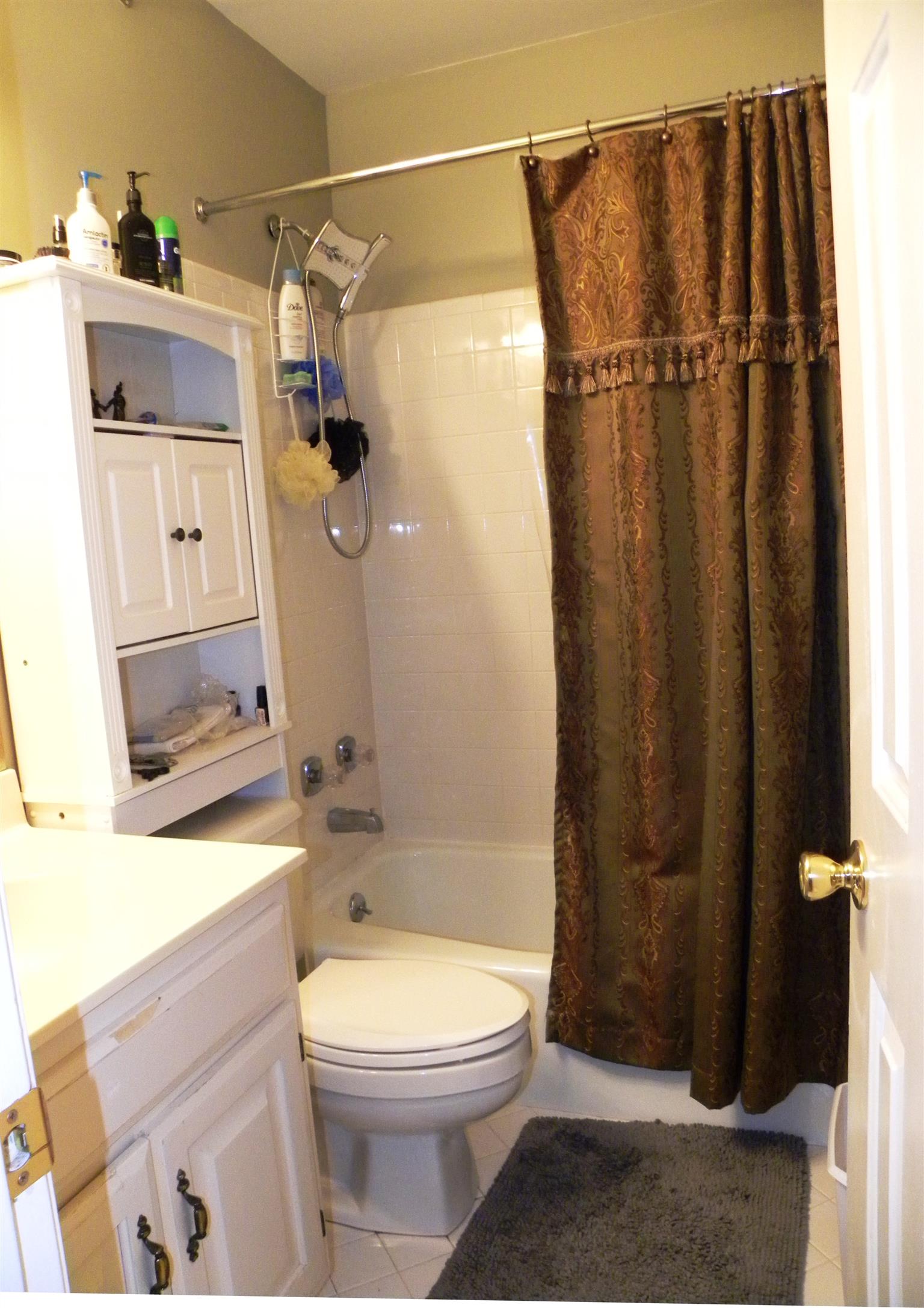745 General George Patton Road Nashville, TN 37221 - Photo 9 of 12 a bathroom with a toilet and a shower