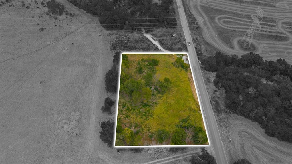 2615 South Houston School Road Lancaster, TX 75146 - Photo 1 of 15 Expansive undeveloped land featuring mature trees and a natural growth landscape