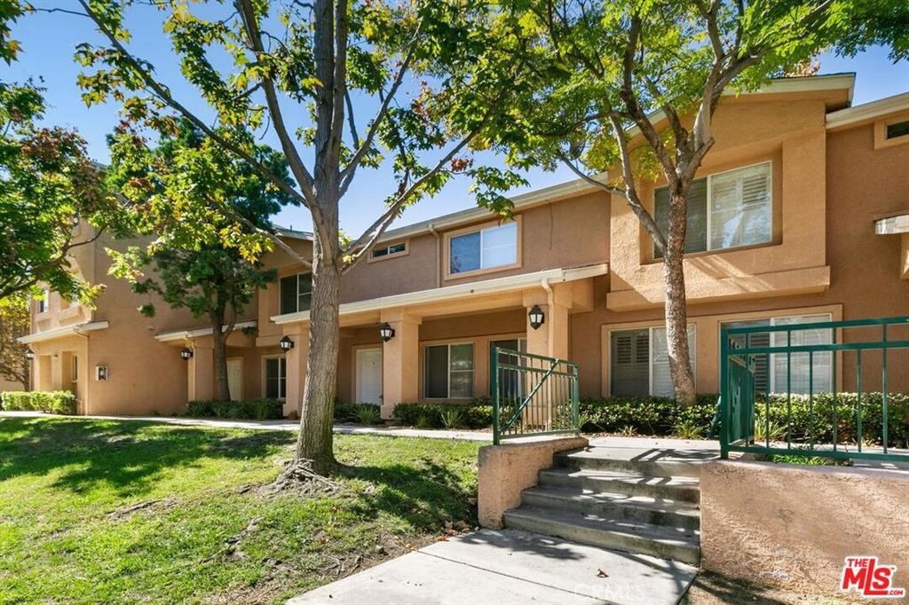 1050 Harbor Heights Drive, Unit I Harbor City, CA 90710 - Photo 4 of 7 front view of a house with a yard