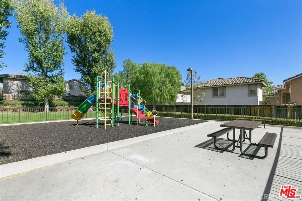 1050 Harbor Heights Drive, Unit I Harbor City, CA 90710 - Photo 6 of 7 a view of a park with potted plants