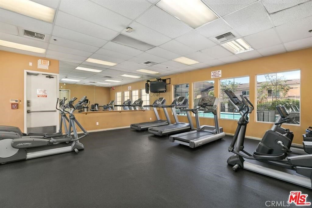 1050 Harbor Heights Drive, Unit I Harbor City, CA 90710 - Photo 7 of 7 a view of a room with gym equipment