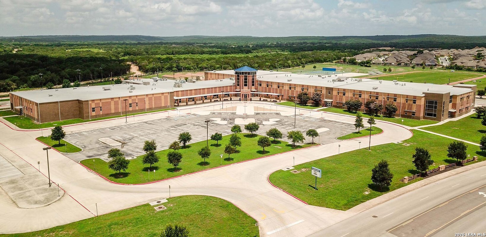 12317 Horowitz San Antonio, TX 78254 - Photo 7 of 7 an aerial view of a swimming pool with an outdoor seating