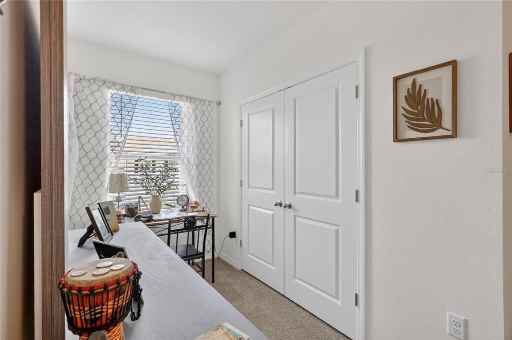 16632 Grotto Steam Place Wimauma, FL 33598 - Photo 21 of 42 a view of a livingroom with furniture and window