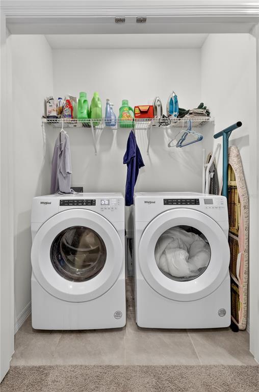 16632 Grotto Steam Place Wimauma, FL 33598 - Photo 23 of 42 a utility room with dryer and washer