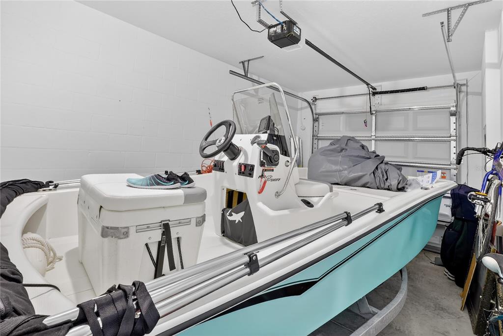 16632 Grotto Steam Place Wimauma, FL 33598 - Photo 27 of 42 a view of a room with gym equipment