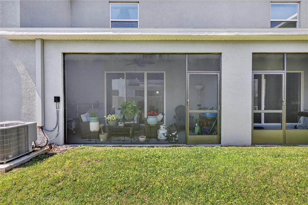 16632 Grotto Steam Place Wimauma, FL 33598 - Photo 31 of 42 a front view of a house with a yard