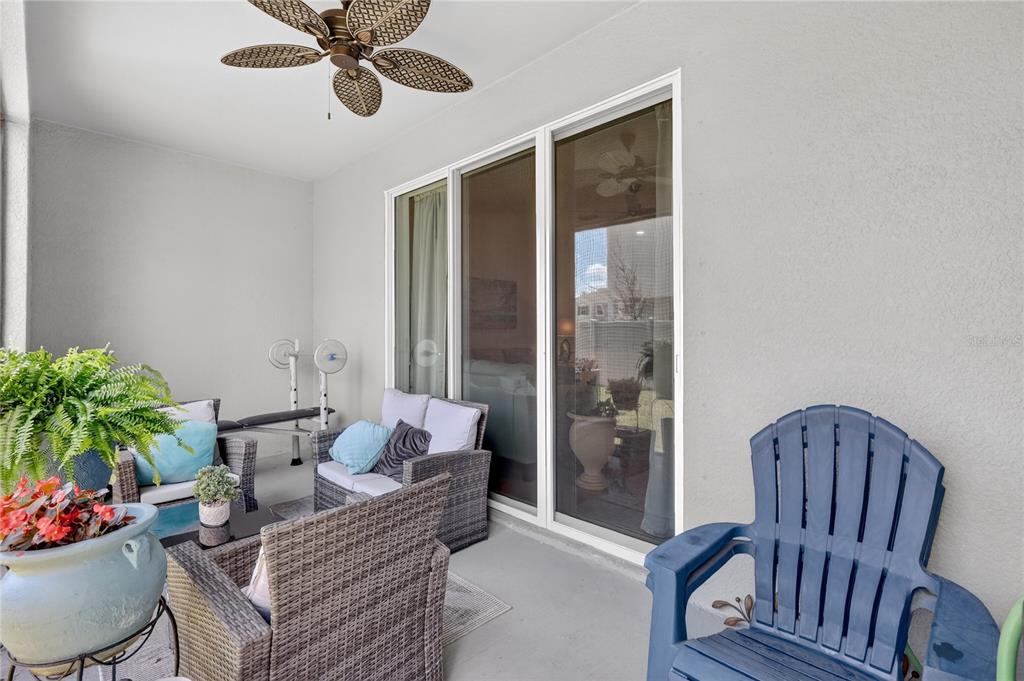 16632 Grotto Steam Place Wimauma, FL 33598 - Photo 32 of 42 a living room with furniture and a large window