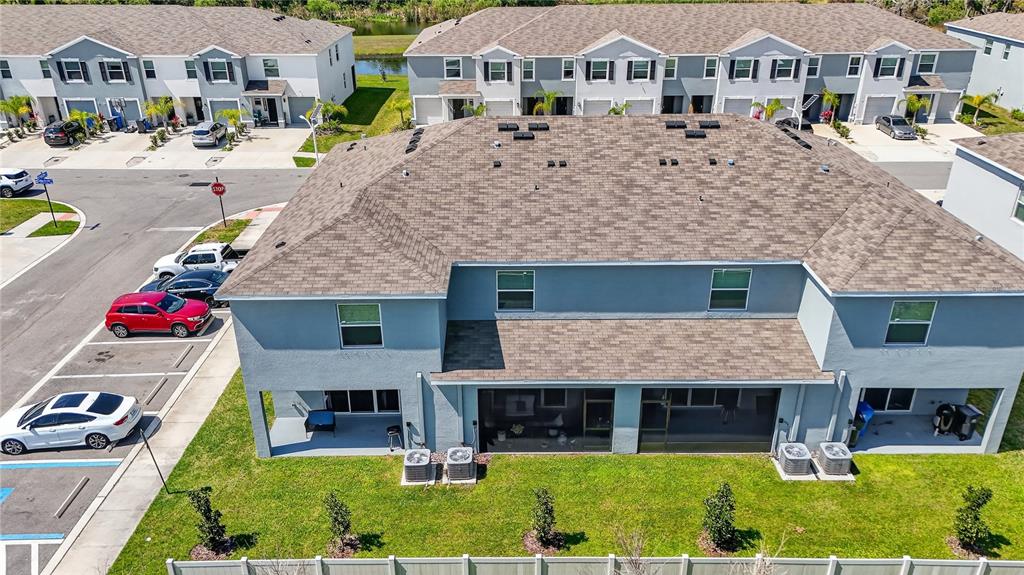 16632 Grotto Steam Place Wimauma, FL 33598 - Photo 39 of 42 a aerial view of a house with garden