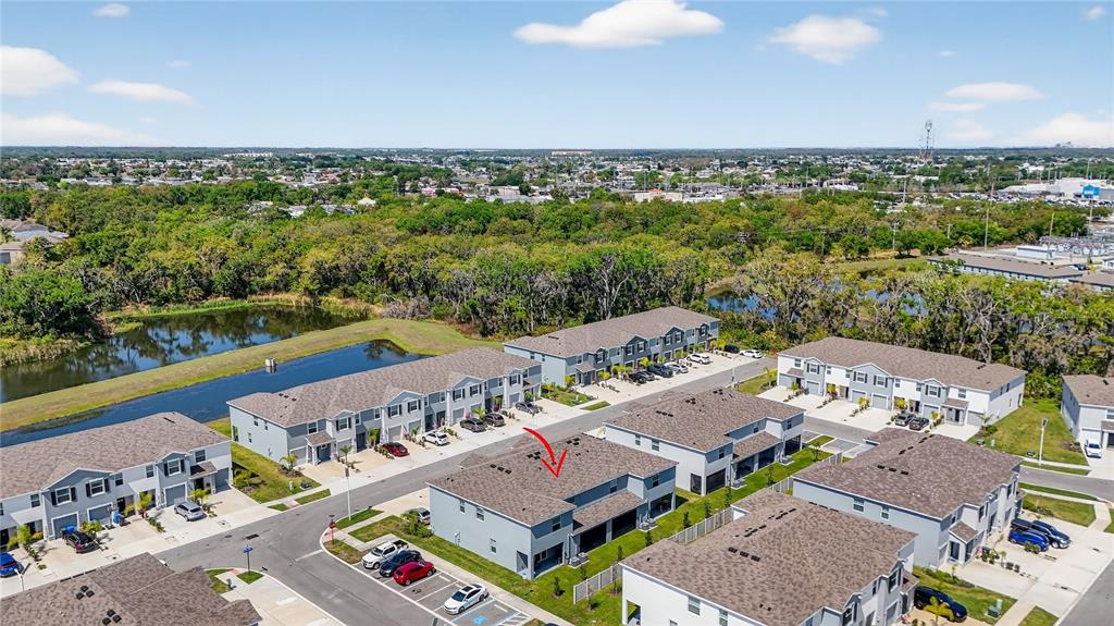 16632 Grotto Steam Place Wimauma, FL 33598 - Photo 42 of 42 an aerial view of a house with a garden