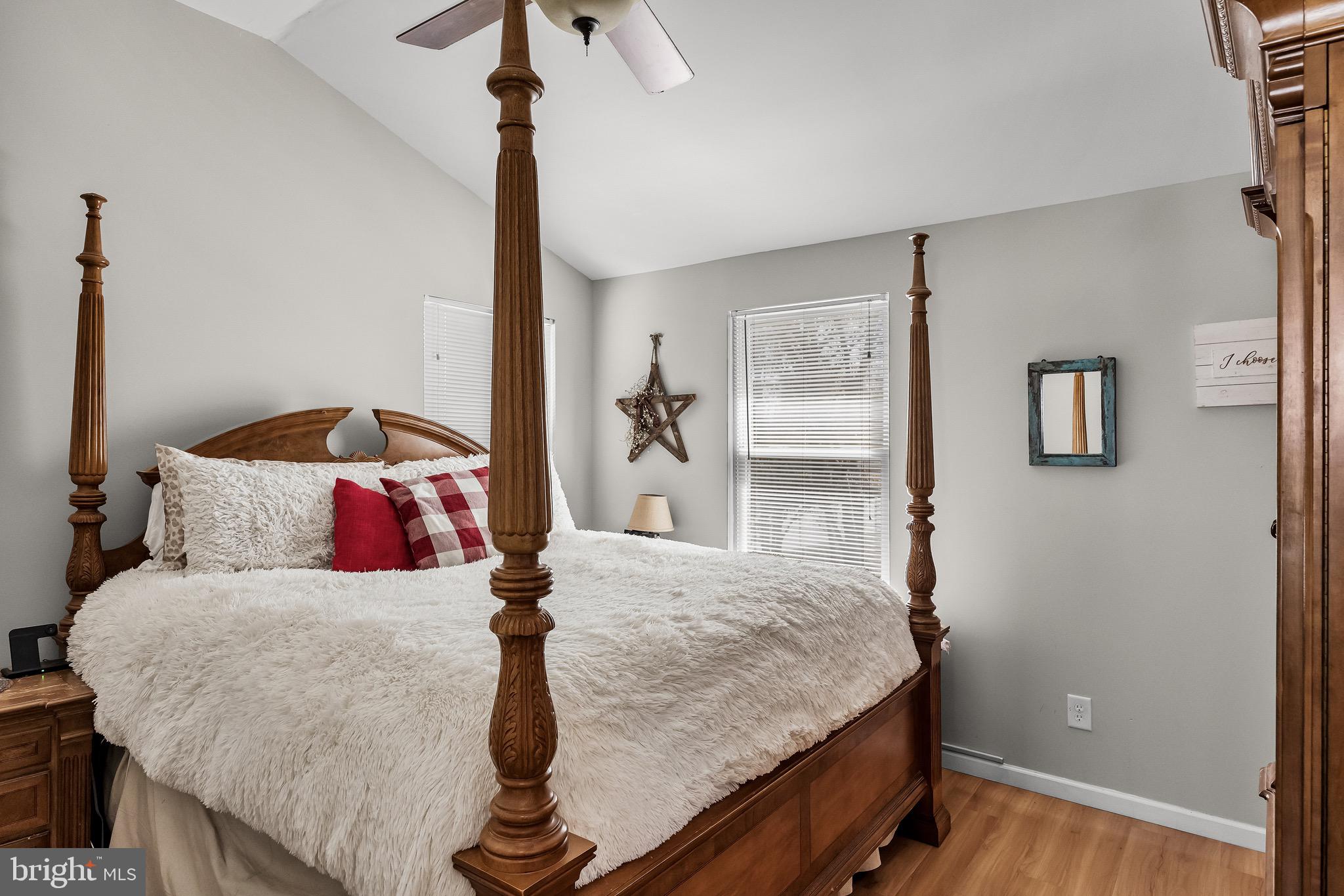 293 Waterford-Blue Anchor Road Hammonton, NJ 08037 - Photo 11 of 24 a bedroom with a bed and wooden floor