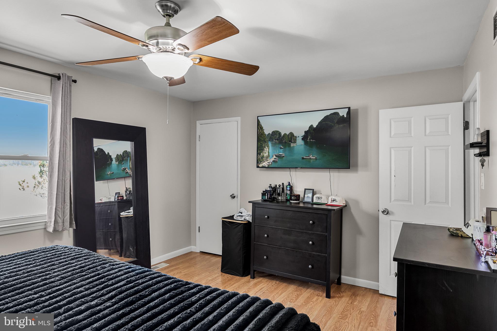 293 Waterford-Blue Anchor Road Hammonton, NJ 08037 - Photo 14 of 24 a bedroom with a bed and a flat tv screen on dresser