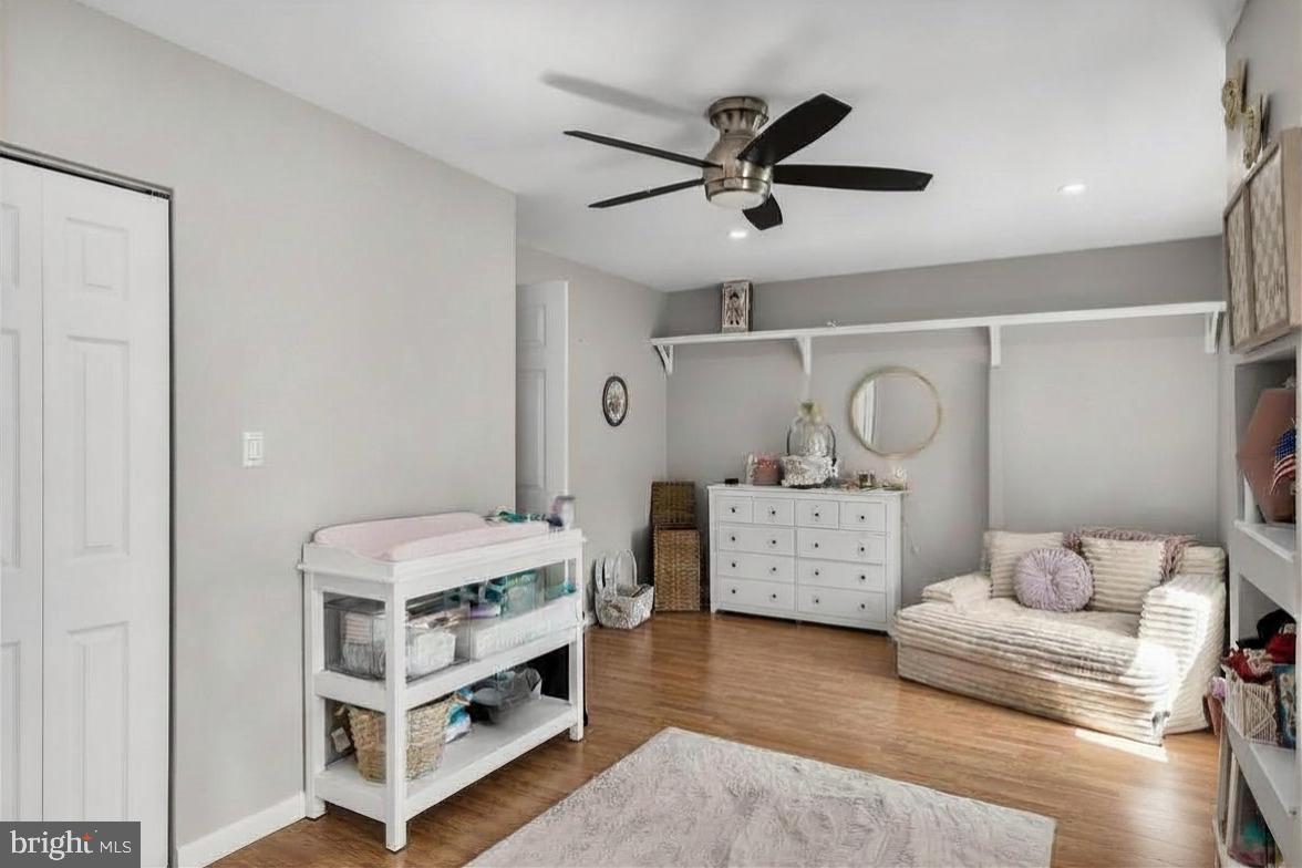 293 Waterford-Blue Anchor Road Hammonton, NJ 08037 - Photo 17 of 24 a bedroom with furniture and a chandelier