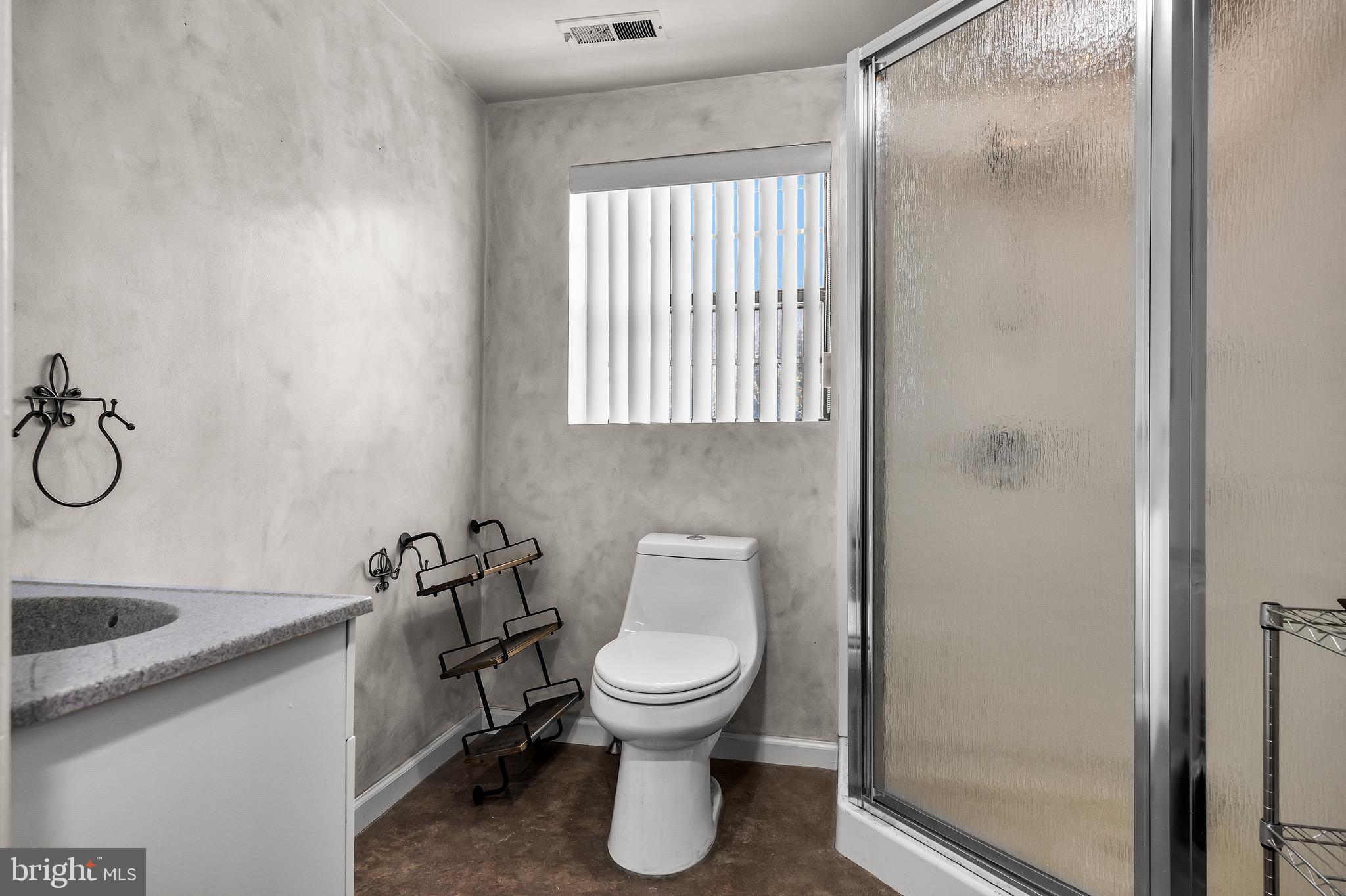 293 Waterford-Blue Anchor Road Hammonton, NJ 08037 - Photo 19 of 24 a bathroom with a toilet and a sink
