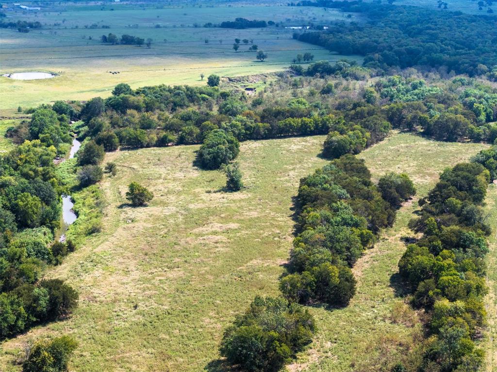9520 Cr 262 Crandall Tx 75114 Crandall, TX 75114 - Photo 15 of 18 a view of a yard with an outdoor space