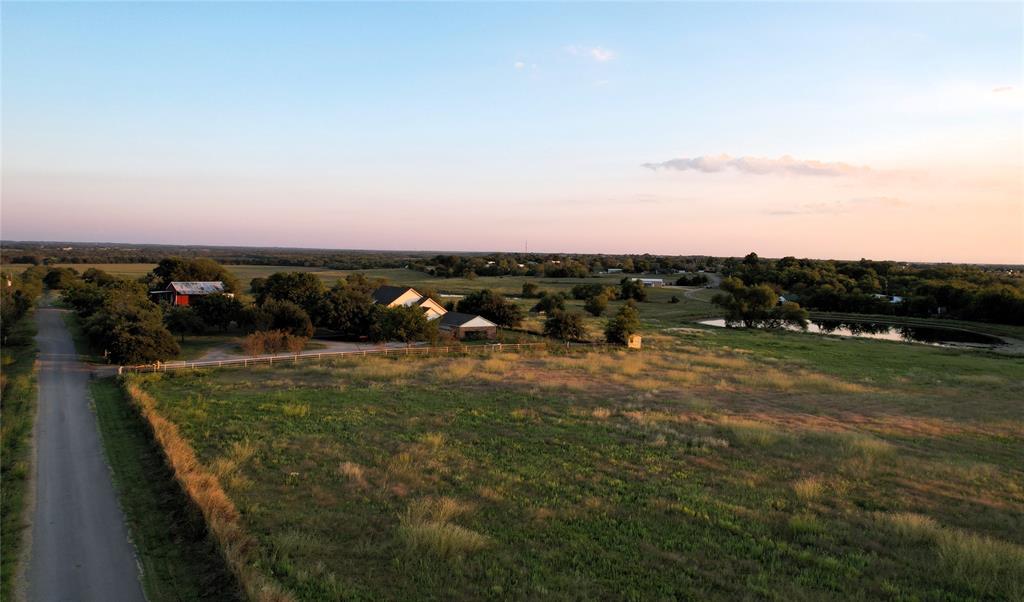 9520 Cr 262 Crandall Tx 75114 Crandall, TX 75114 - Photo 18 of 18 a view of a golf course with a lake