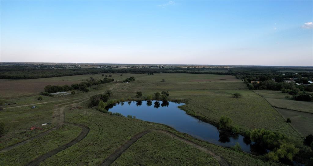 9520 Cr 262 Crandall Tx 75114 Crandall, TX 75114 - Photo 4 of 18 a view of a lake with a yard