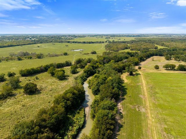 a view of a city with an ocean