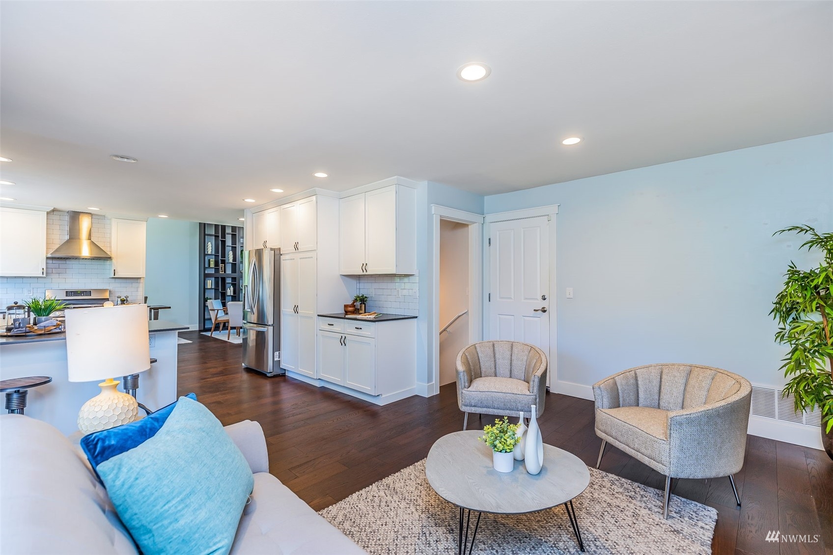 22110 14th Avenue West Bothell, WA 98021 - Photo 15 of 40 a living room with furniture kitchen view and a potted plant