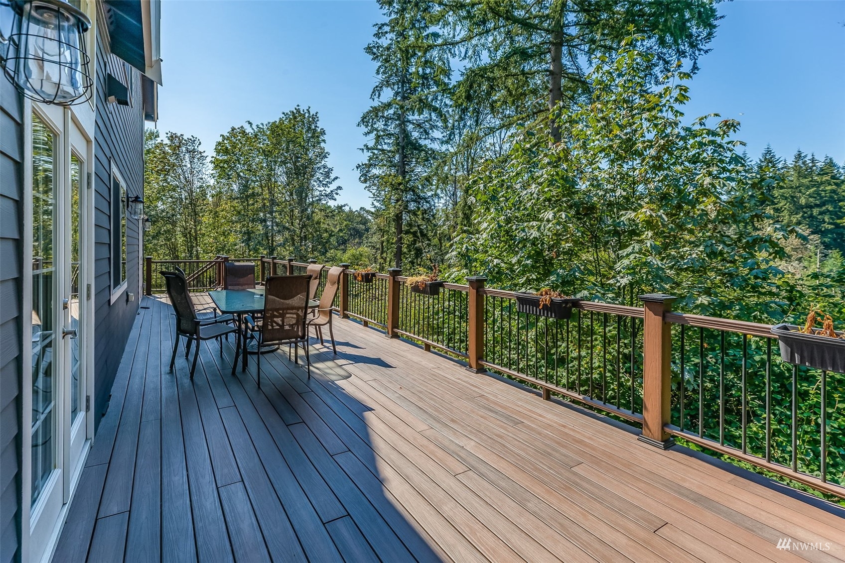 22110 14th Avenue West Bothell, WA 98021 - Photo 18 of 40 a view of balcony with furniture and wooden floor