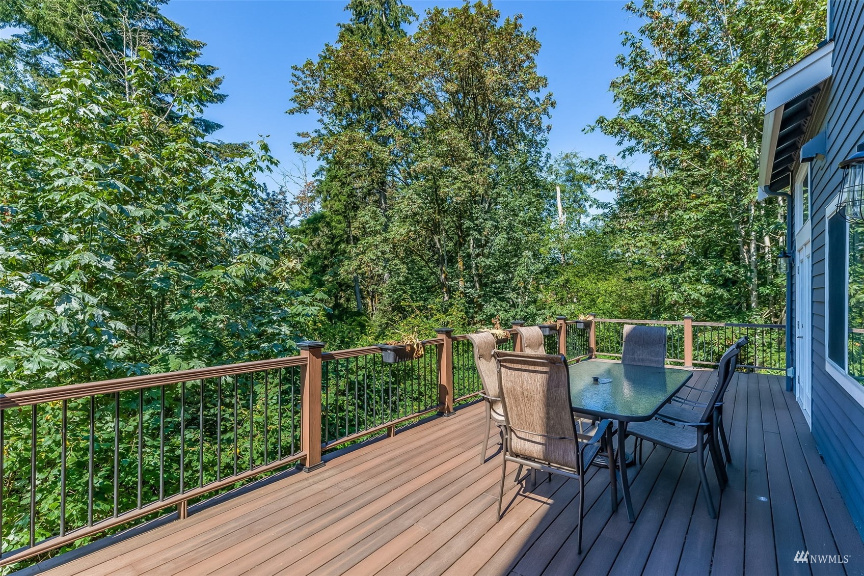 22110 14th Avenue West Bothell, WA 98021 - Photo 19 of 40 a view of a deck with chairs and wooden floor