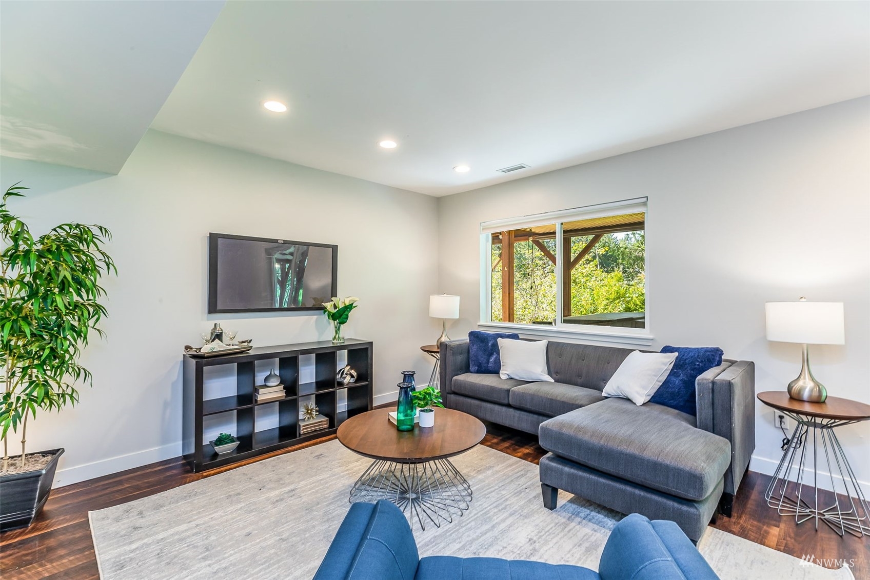 22110 14th Avenue West Bothell, WA 98021 - Photo 20 of 40 a living room with furniture and a wooden floor