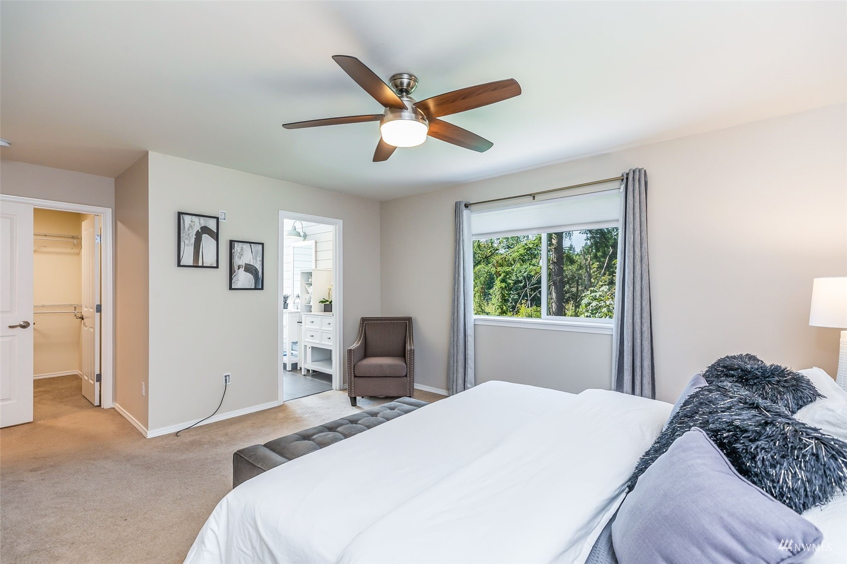 22110 14th Avenue West Bothell, WA 98021 - Photo 29 of 40 a bedroom with a large bed and a window