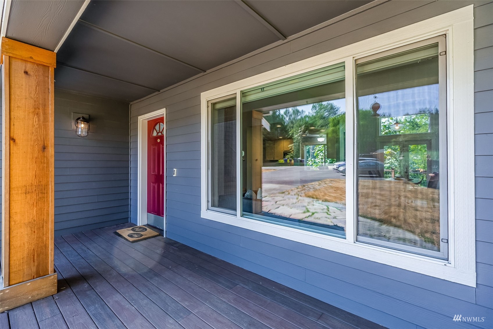 22110 14th Avenue West Bothell, WA 98021 - Photo 3 of 40 a view of empty room with wooden floor and floor to ceiling window