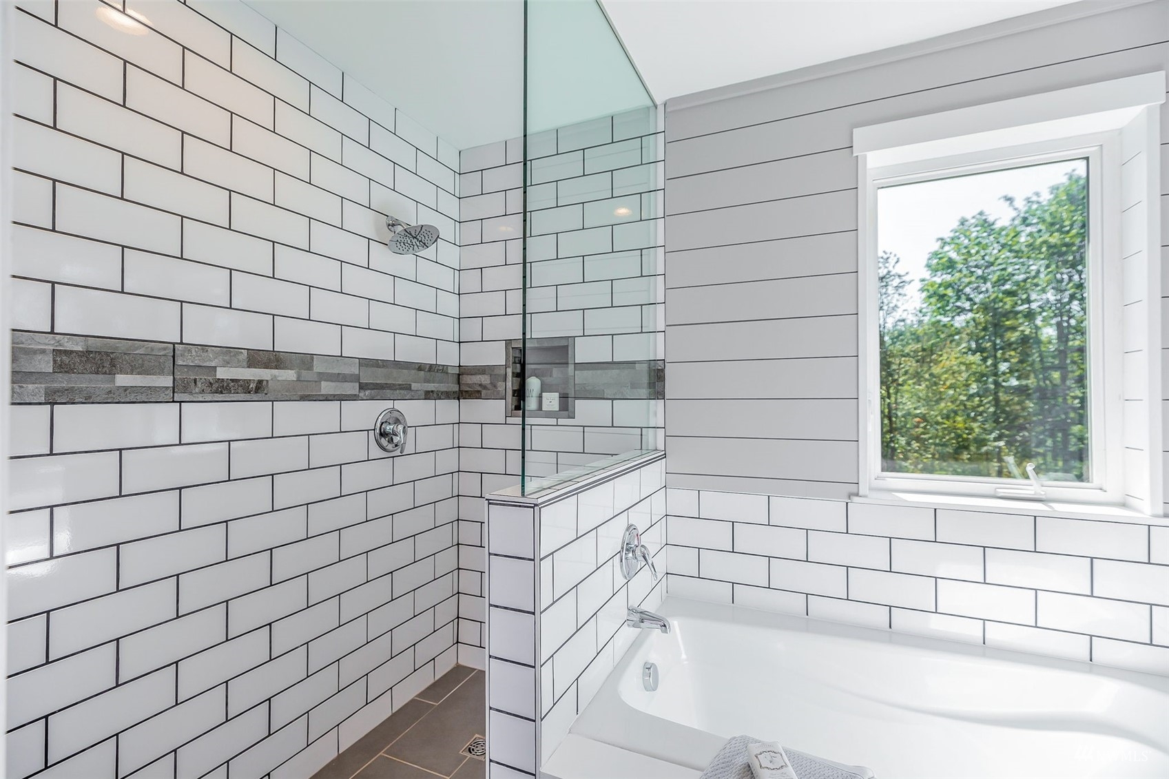 22110 14th Avenue West Bothell, WA 98021 - Photo 32 of 40 a bathroom with a bathtub and shower