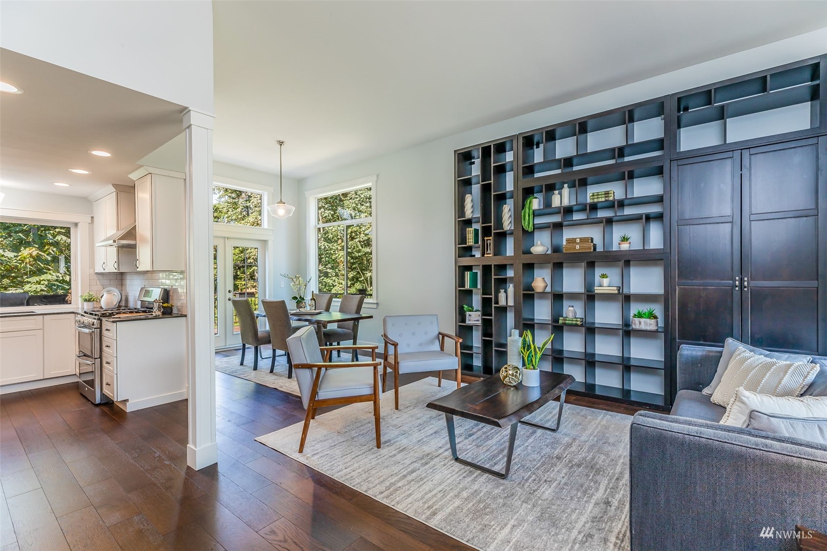 22110 14th Avenue West Bothell, WA 98021 - Photo 6 of 40 a living room with furniture and a book shelf