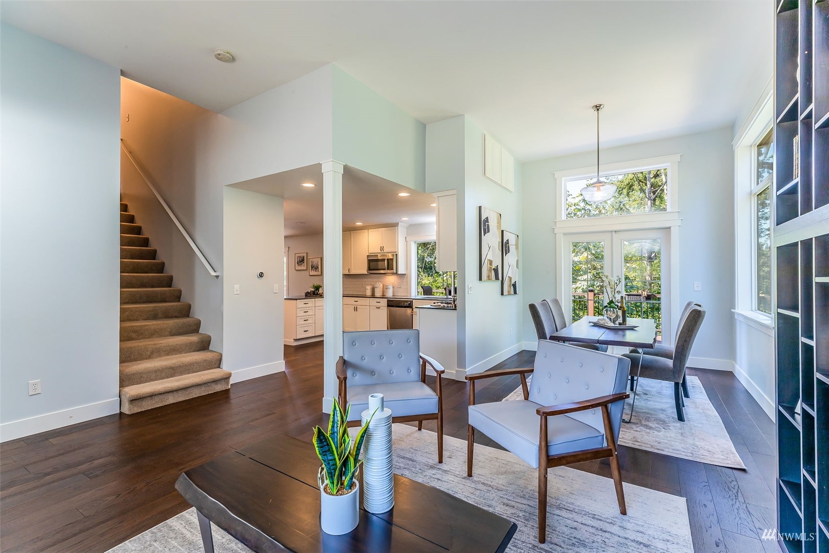 22110 14th Avenue West Bothell, WA 98021 - Photo 7 of 40 a view of a dining room with furniture window and wooden floor