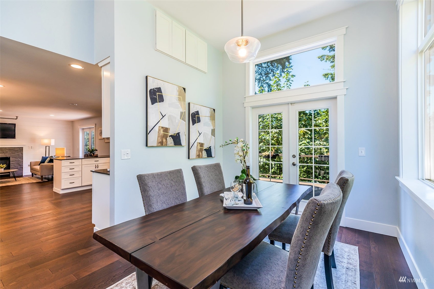 22110 14th Avenue West Bothell, WA 98021 - Photo 8 of 40 a view of a dining room with furniture window and wooden floor