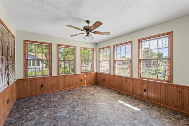 a view of empty room with windows