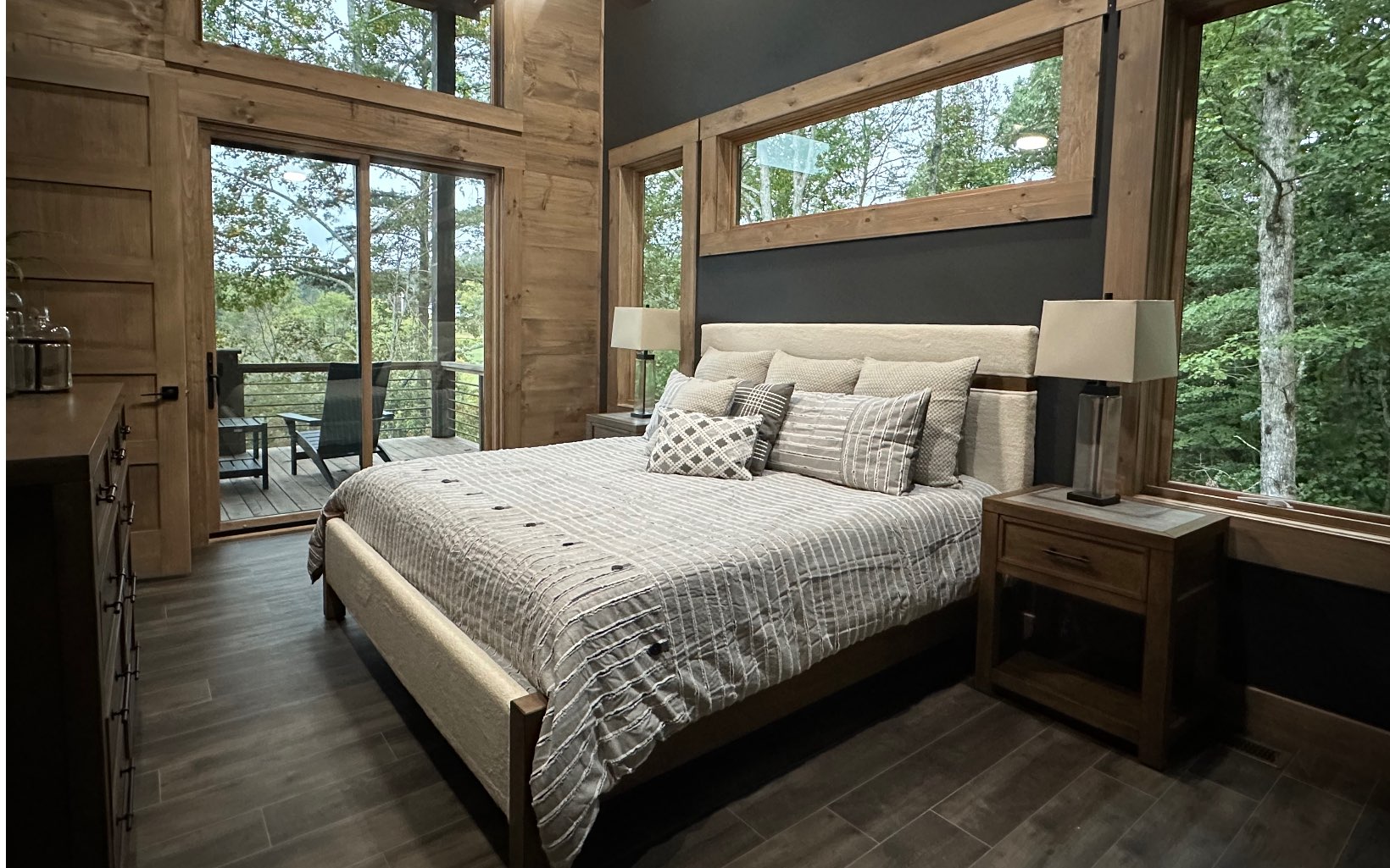 140 Watkins Farm Road Blue Ridge, GA 30513 - Photo 11 of 63 a bedroom with a bed and a large window