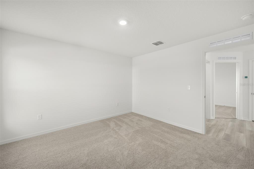 13328 Tula Loop Astatula, FL 34705 - Photo 14 of 18 a view of an empty room