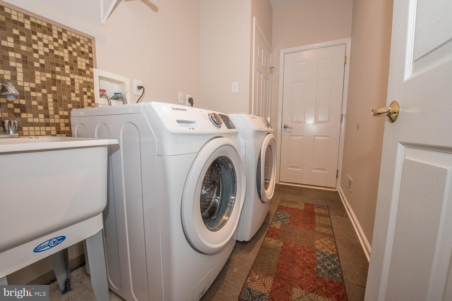 515 Gilmer Road Coatesville, PA 19320 - Photo 16 of 26 First Floor Laundry with Utility Sink