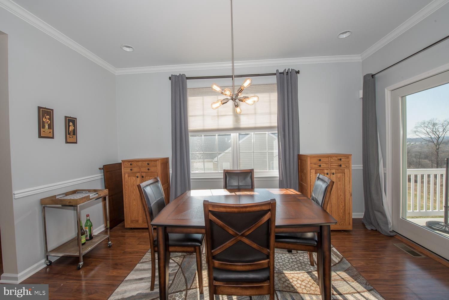 515 Gilmer Road Coatesville, PA 19320 - Photo 7 of 26 Formal Dining Room with Door to Deck