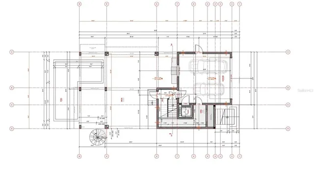 a black and white photo of a living room