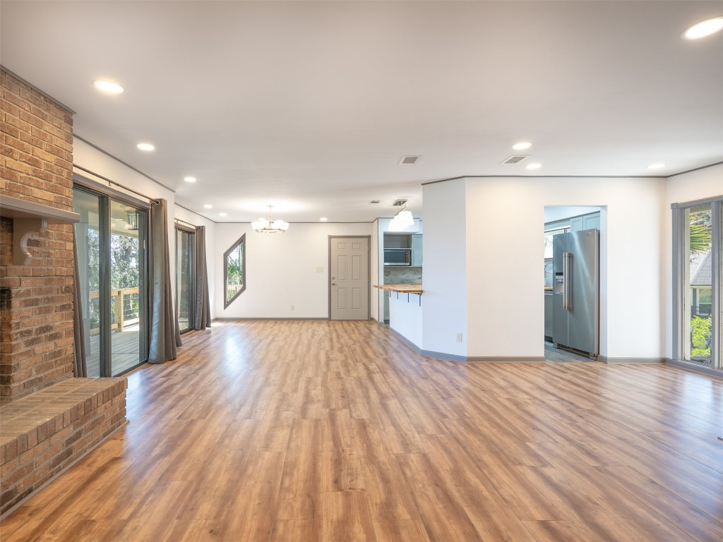 97578 Pirates Point Road Yulee, FL 32097 - Photo 17 of 64 a view of empty room with wooden floor