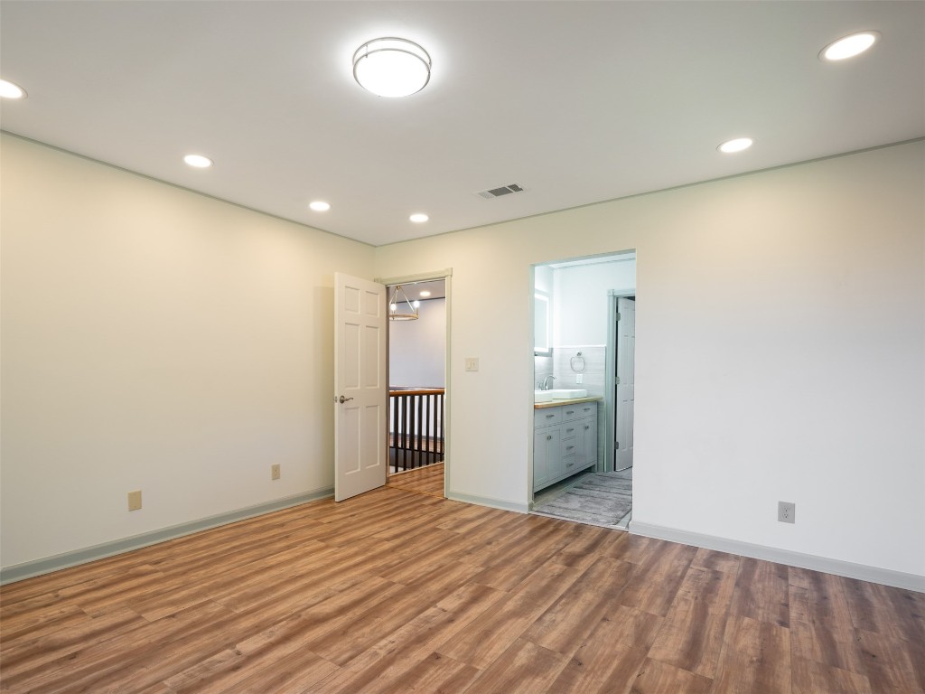 97578 Pirates Point Road Yulee, FL 32097 - Photo 26 of 64 a view of an empty room with wooden floor and closet