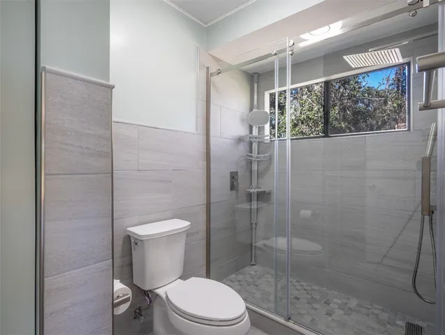 a view of a porch with wooden floor and outdoor space