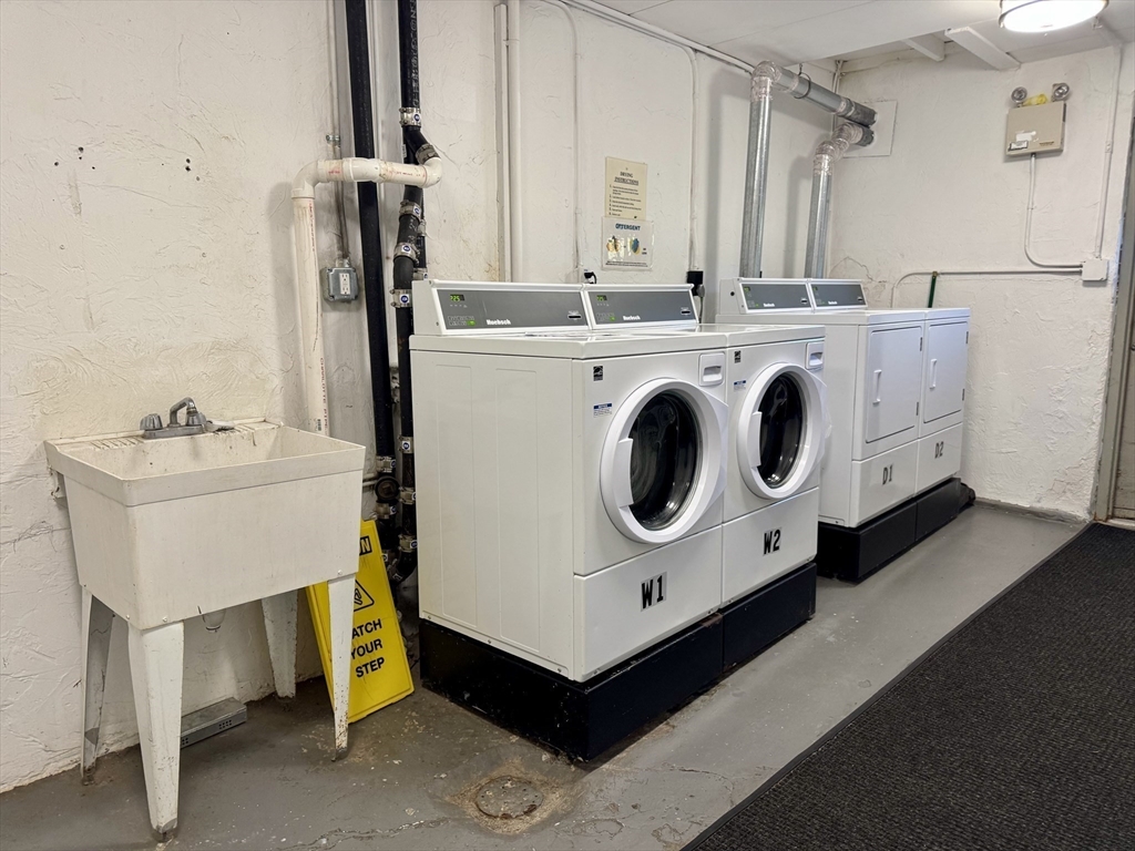 147 Turner Road, Unit 80 Holliston, MA 01746 - Photo 19 of 22 a utility room with dryer and washer