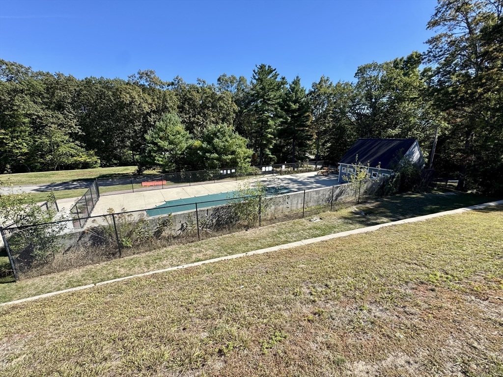 147 Turner Road, Unit 80 Holliston, MA 01746 - Photo 22 of 22 a view of a backyard