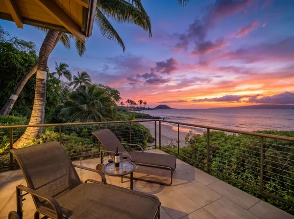 a view of a chairs and table in patio