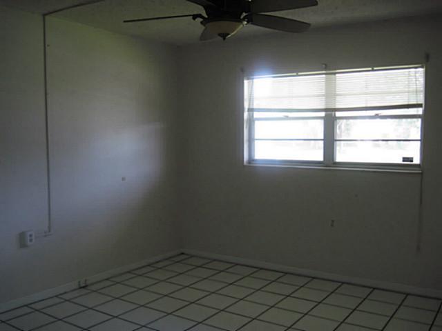 1900 South Kanner Highway, Unit 3104 Stuart, FL 34994 - Photo 12 of 20 an empty room with a window