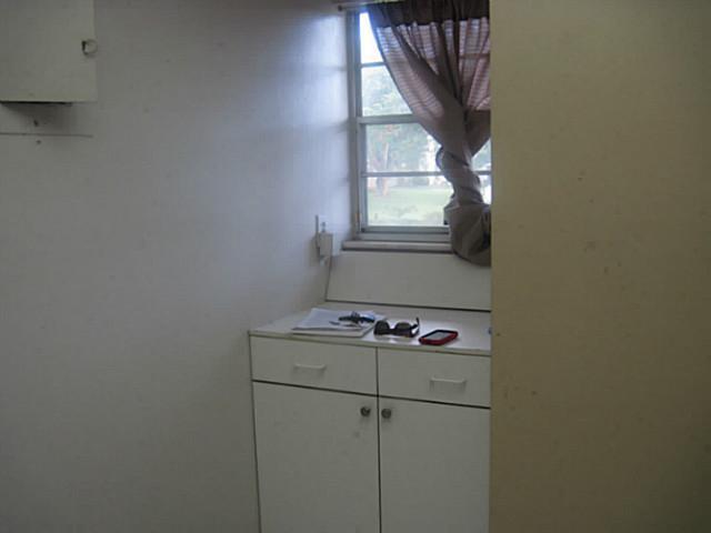 1900 South Kanner Highway, Unit 3104 Stuart, FL 34994 - Photo 19 of 20 a storage room with washer and dryer