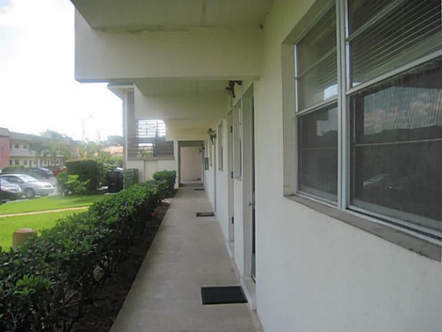 1900 South Kanner Highway, Unit 3104 Stuart, FL 34994 - Photo 5 of 20 a view of a pathway both side of a house