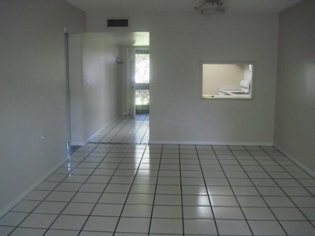 1900 South Kanner Highway, Unit 3104 Stuart, FL 34994 - Photo 7 of 20 a view of an empty room and window